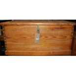 An early 20th century stained pine hinge topped tool chest, having rope end carry handles, w.89cm