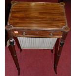 A Regency mahogany and ebony strung work table, having single frieze drawer and pleated basket (