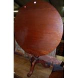 A 19th century mahogany circular tilt-top pedestal tripod table, dia.89cm