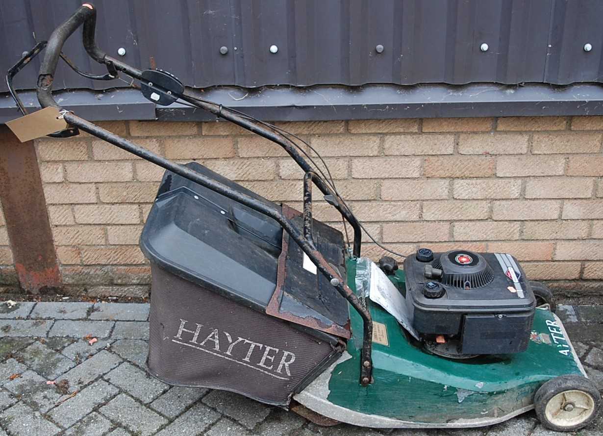 A Briggs & Stratton Hayter Harrier 48 petrol driven lawnmower, with grass collecting box