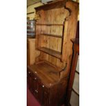 A reclaimed stained pine narrow kitchen dresser, w.83cm