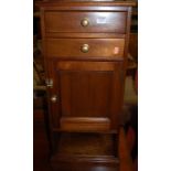 A mahogany single door bedside cupboard, having twin upper drawers and open lower compartment, w.