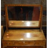 A 19th century mahogany swing dressing mirror, raised on three drawer box base, width 55.5cm