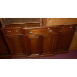 A 19th century mahogany breakfront sideboard, having three frieze drawers over four conforming lower