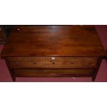 A contemporary hardwood single drawer two-tier rectangular coffee table, length 113cm