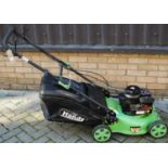 A Briggs & Stratton 450 Series petrol-driven lawn mower, with grass collecting boxCondition