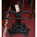 A Victorian black painted cast iron stickstand, with floral pierced decoration, w.59cmCondition