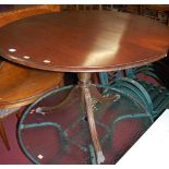 A mahogany fixed top circular pedestal breakfast table (marriage), dia. 101.5cm