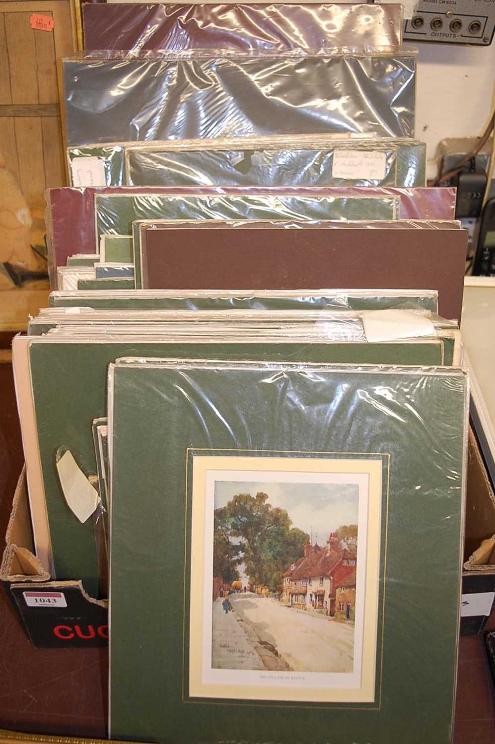 A large quantity of unframed but mounted prints and hand-coloured topographical engravings, 19th and