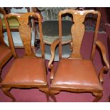 A set of six early 20th century walnut and figured walnut splatback dining chairs, in the Queen Anne