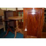 A Victorian mahogany single door hanging corner cupboard; together with a modern pine circular