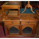 A contemporary Eastern hardwood double door low side cupboard, having twin frieze drawers, w.