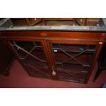 A late 19th century mahogany and satinwood inlaid double door astragal glazed bookcase (top