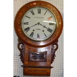 A Victorian figured walnut and inlaid circular drop trunk wall clock, the dial signed J Clucas,