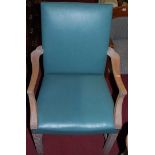 A pair of limed oak framed and turquoise vinyl upholstered elbow chairs, w.60cm