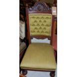 An Edwardian walnut and floral upholstered nursing chair; together with an Edwardian walnut framed