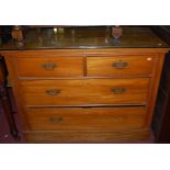 An Edwardian satin walnut chest of two short over two long drawers, width 103.5cm