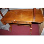 A reproduction mahogany drop flap two drawer sofa table, width (leaves down) 91.5cm
