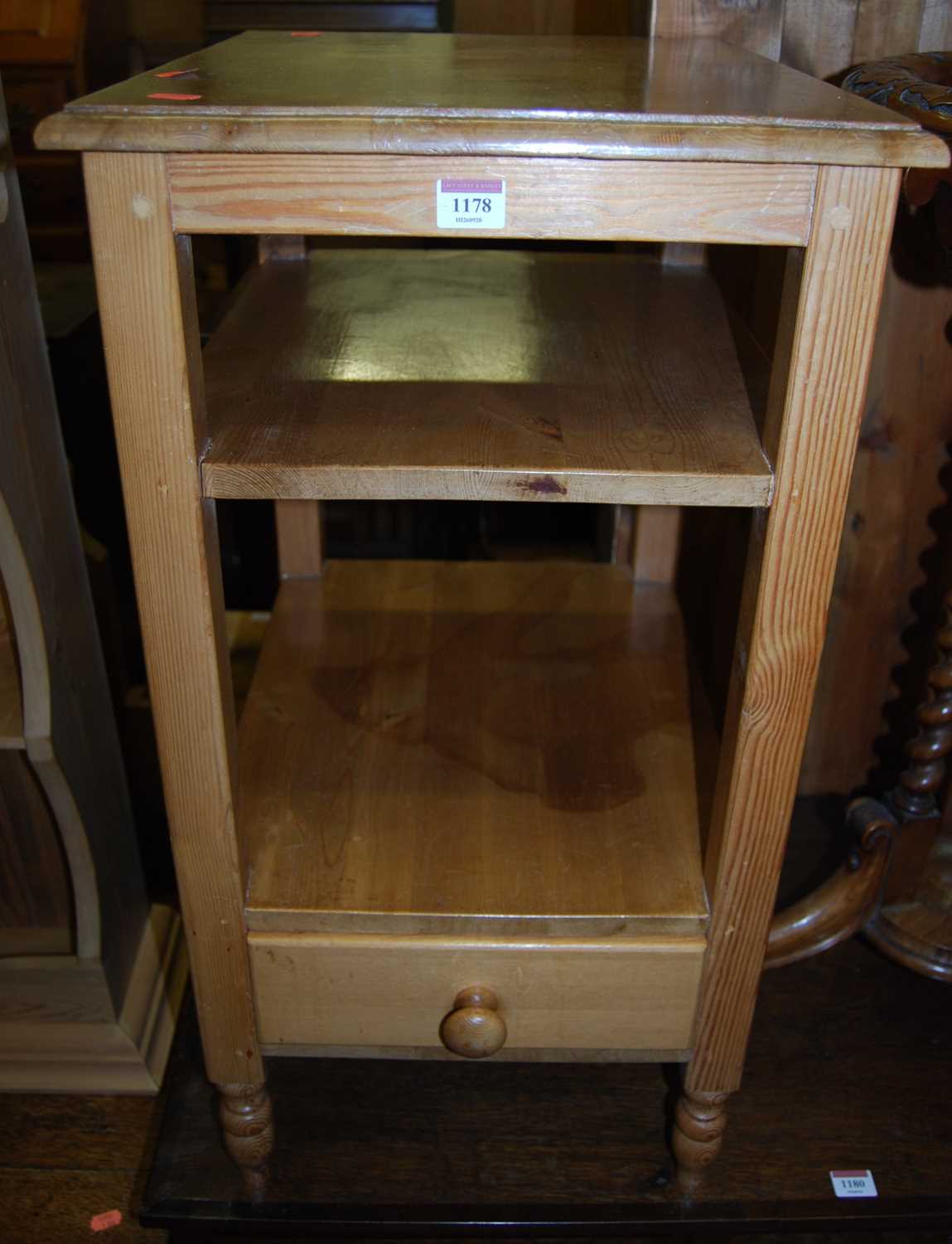 A modern pine three-tier stand, with single lower drawer; together with a modern pine hanging two-