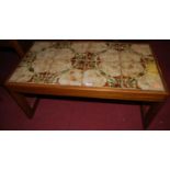 A 1970s teak and tile top inset low rectangular coffee table, width 85.5cm