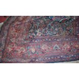 A large Persian woollen blue ground Tabriz rugCondition report: Width 266, length 370cm.