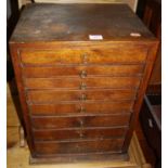 An early 20th century oak table-top eight-drawer collectors chest, w.38.5cm