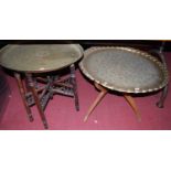 An early 20th century engraved brass circular low folding Benares table, dia. 77cm, together with