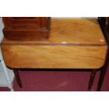 A Victorian mahogany round cornered Pembroke table, having single end drawer and on turned