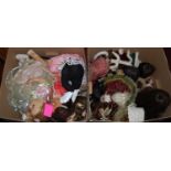 Two boxes containing a large quantity of modern porcelain dolls, all fully clothed, some with