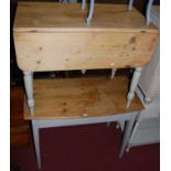 A Victorian round cornered pine partly grey painted dropflap kitchen table, having single end