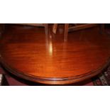 A Victorian style mahogany D-end extending dining table, the thumb-moulded top with wind-out
