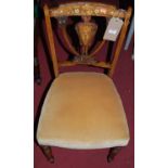 A pair of Edwardian rosewood satinwood and bone inlaid salon side chairs