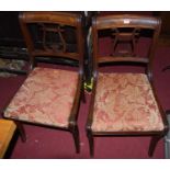 A set of ten Regency style mahogany bar back dining chairs, each having lyre splatbacks with red