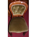 Four mid-Victorian mahogany balloon back dining chairs, having buttoned backs and stuff over seats