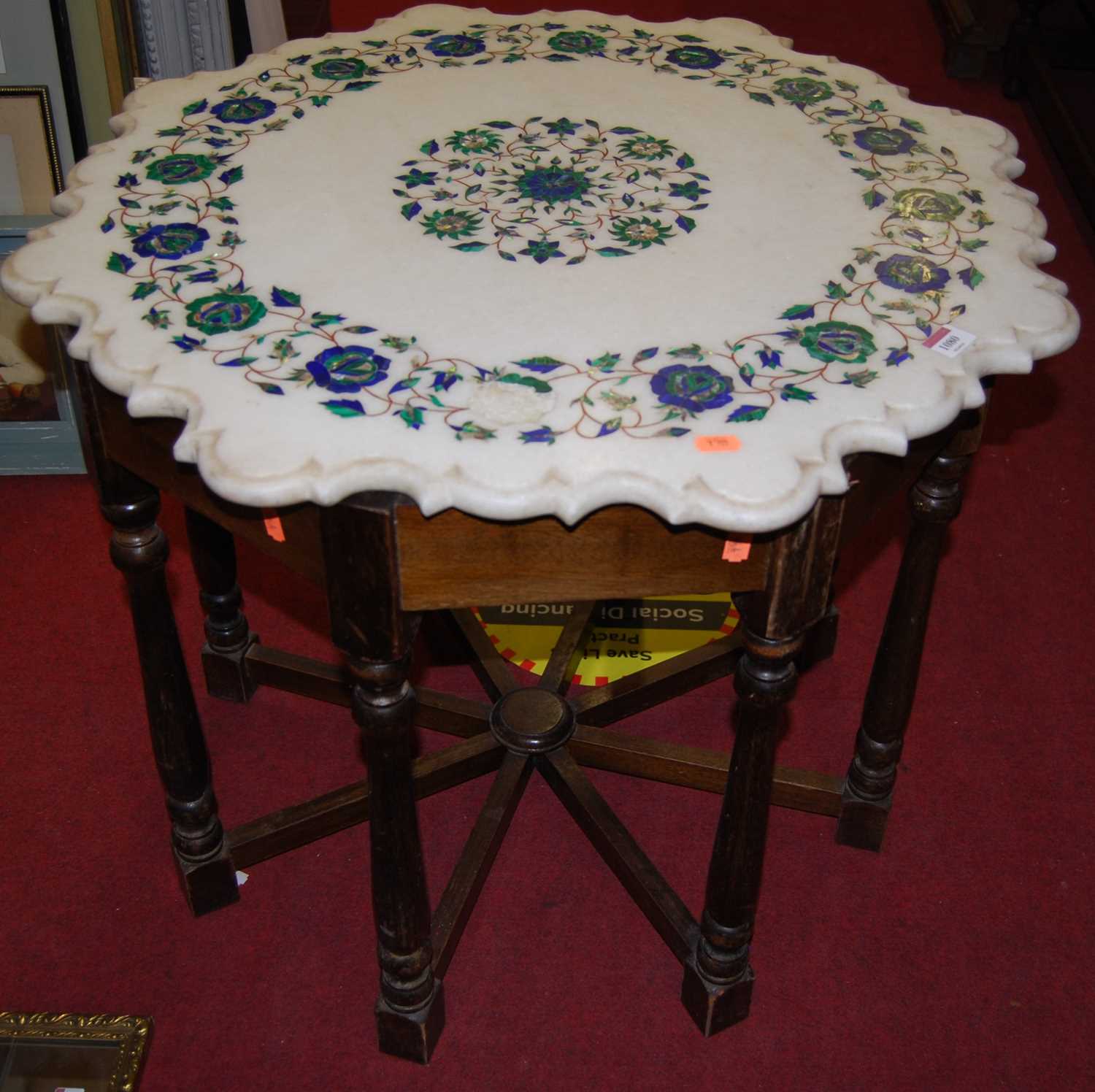 An Indian white marble and specimen inlaid to include malachite and mother of pearl topped