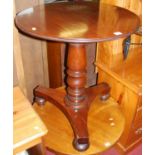 A 19th century mahogany fixed-top circular pedestal tripod occasional table, the turned column