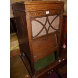 A 1930s oak freestanding 'His Master's Voice' gramophone cabinet, by The Gramophone Company Ltd,