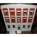 Silber & Fleming - a large late 19th century three storey box back dolls house, dimensions 102 x