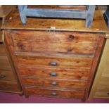 A 19th century provincial stained pine freestanding clerks desk, the gentle sloping hinged cover