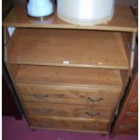 A modern varnished pine chest of three long drawers, having fold-over top, width 80cm