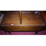 An early Victorian mahogany round cornered Pembroke table, having single end drawer and raised on