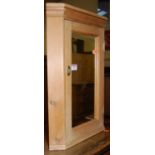 A pine mirror door small hanging corner cupboard; together with an oak table-top book trough (2)