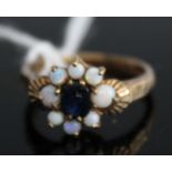A ladies 9ct gold sapphire and opal set flowerhead cluster ring, 2.6g, size L