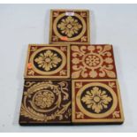 Five various Minton encaustic tiles, each 15x15cm