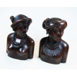 Two 20th century carved hard wood busts of African ladies, height 32cm each