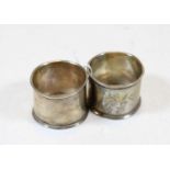 A pair of early 20th century continental white metal napkin rings, each having floral engraved