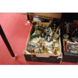 A box of mixed metalware including brass candlesticks, mixed plated ware etc