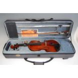 A modern Stentor Conservatoire violin, having a two piece back and ebony finger board, No.