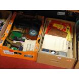 Two boxes of various militaria ephemera to include Hitler's Mein Kampf in 18 weekly parts, a
