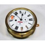 A 20th century brass cased ships wall clock, the enamel dial showing Roman numerals with